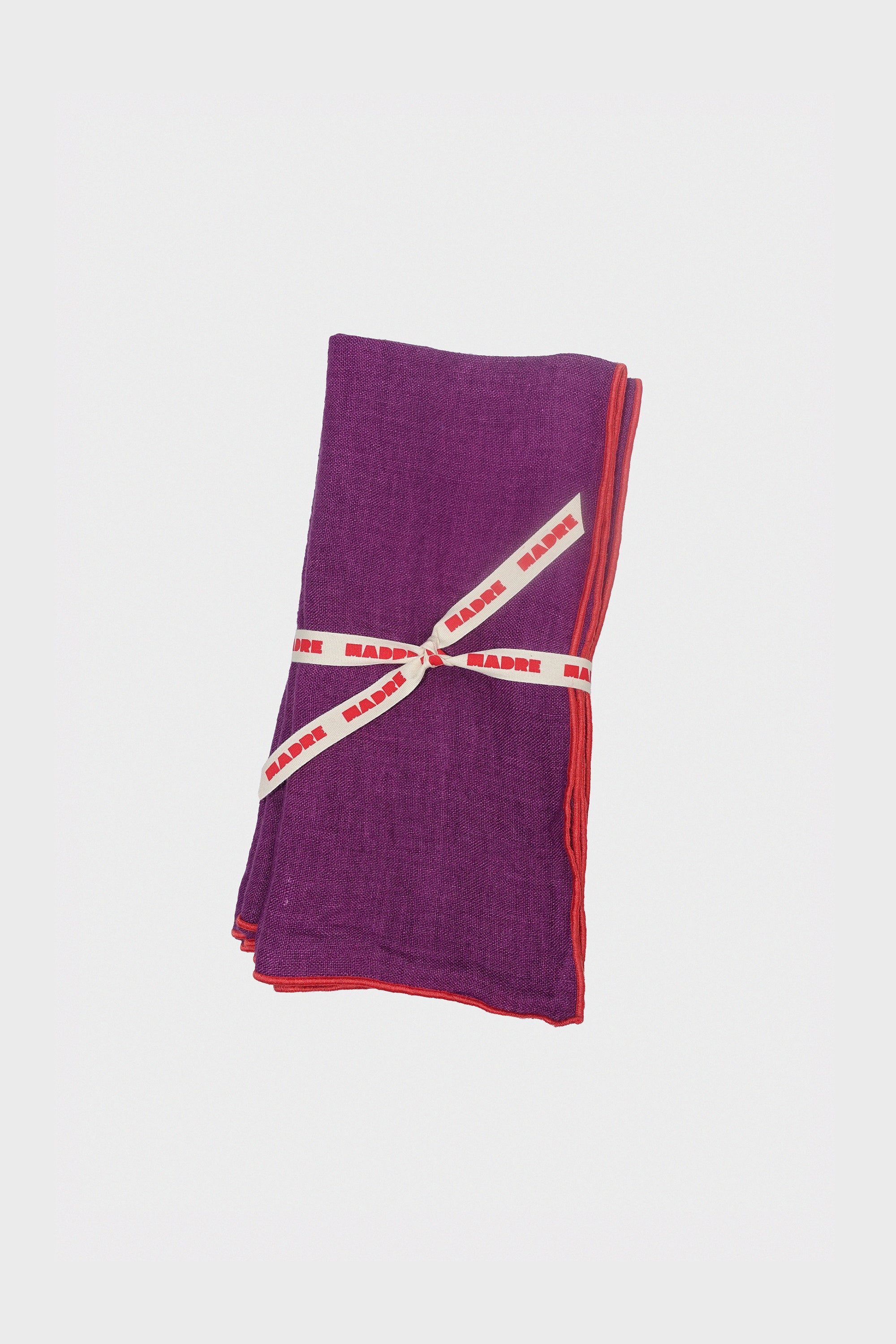 Medium Napkins in Plum: Set of Four BY MADRE LINEN