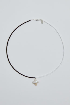 Suma Necklace in brown & white cross