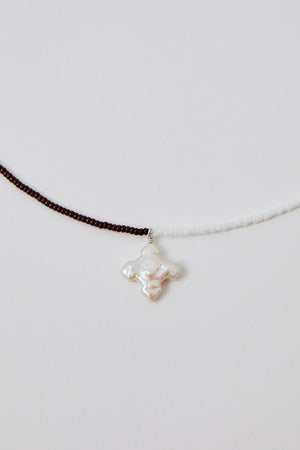 Suma Necklace in brown & white cross